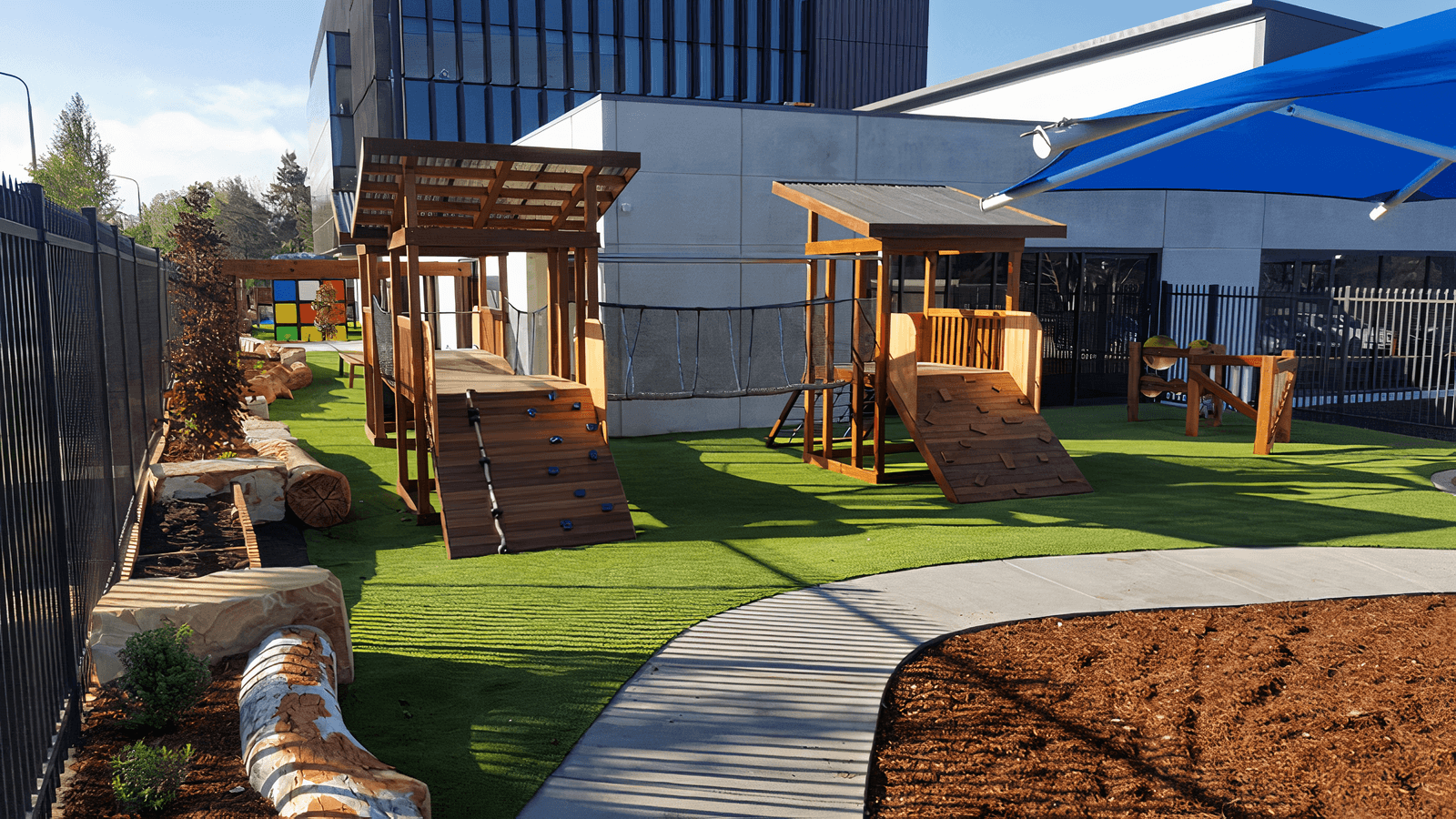Outdoor play area with artifical turf