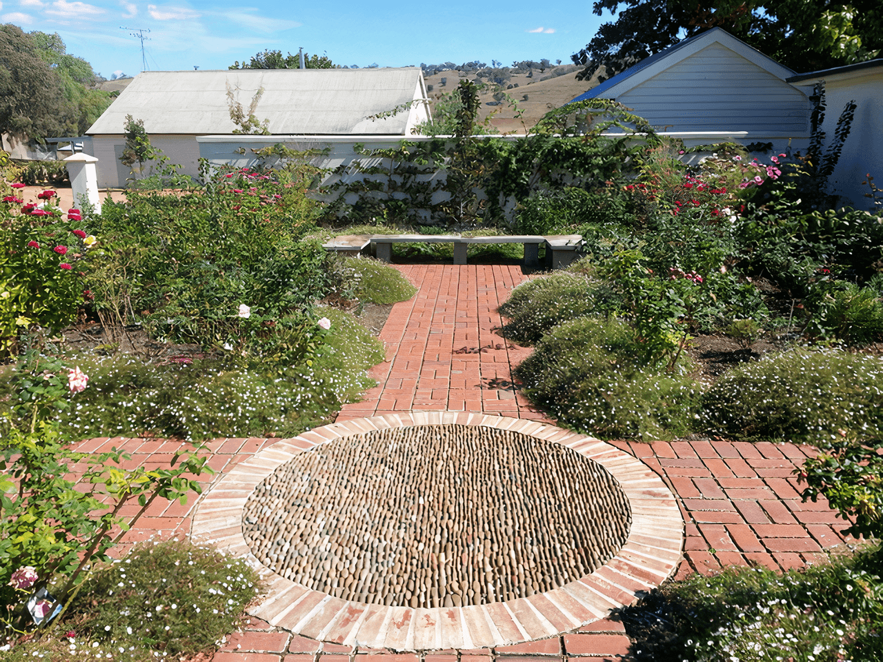 Decorative brick paving and rose garden