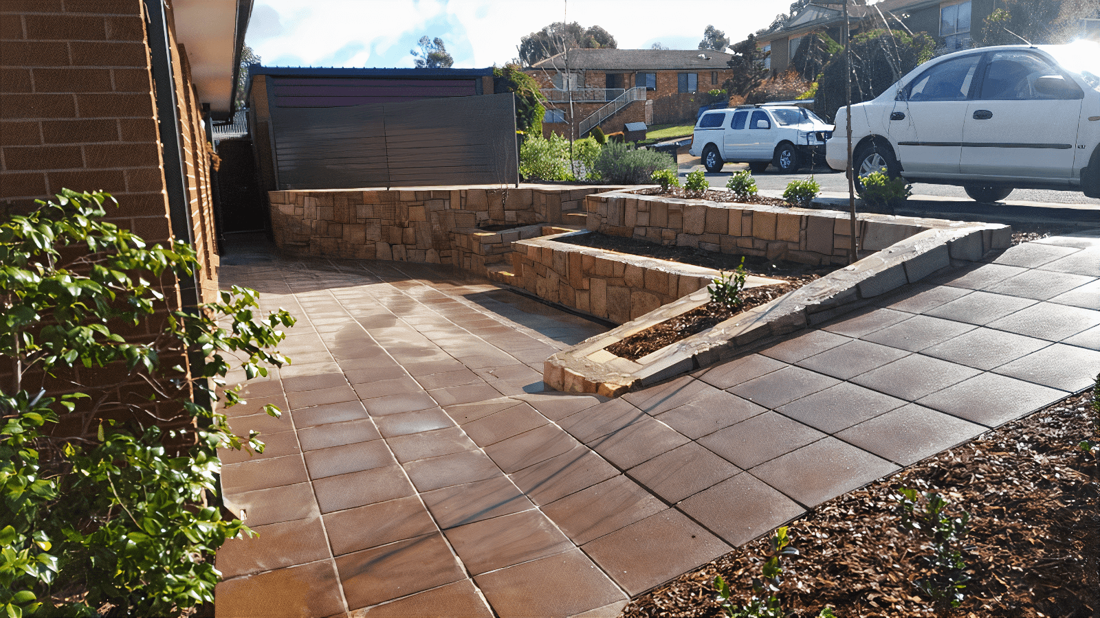 Retaining wall and paving by Dan and Dan Landscaping